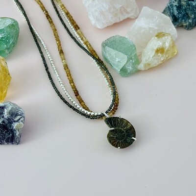 Handmade triple strand necklace with prong set Ammonite