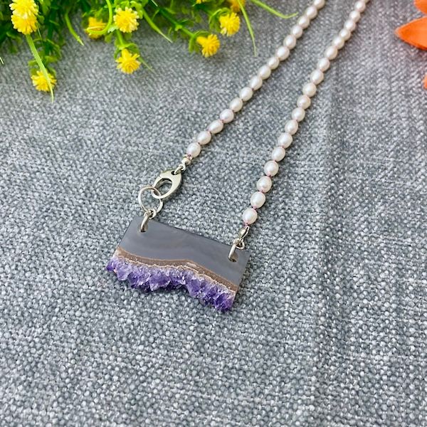 Handmade Necklace with white pearls knotted on purple silk, raw amethyst