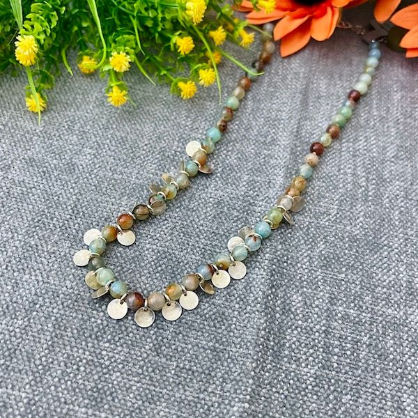 Handmade Necklace with peruvian opal knotted on tan silk w/hammered discs