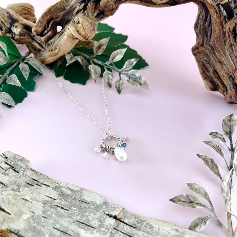Handmade Necklace with faceted ring, white pearl, sky blue topaz, green tourmaline, pink tourmaline, rainbow moonstone,