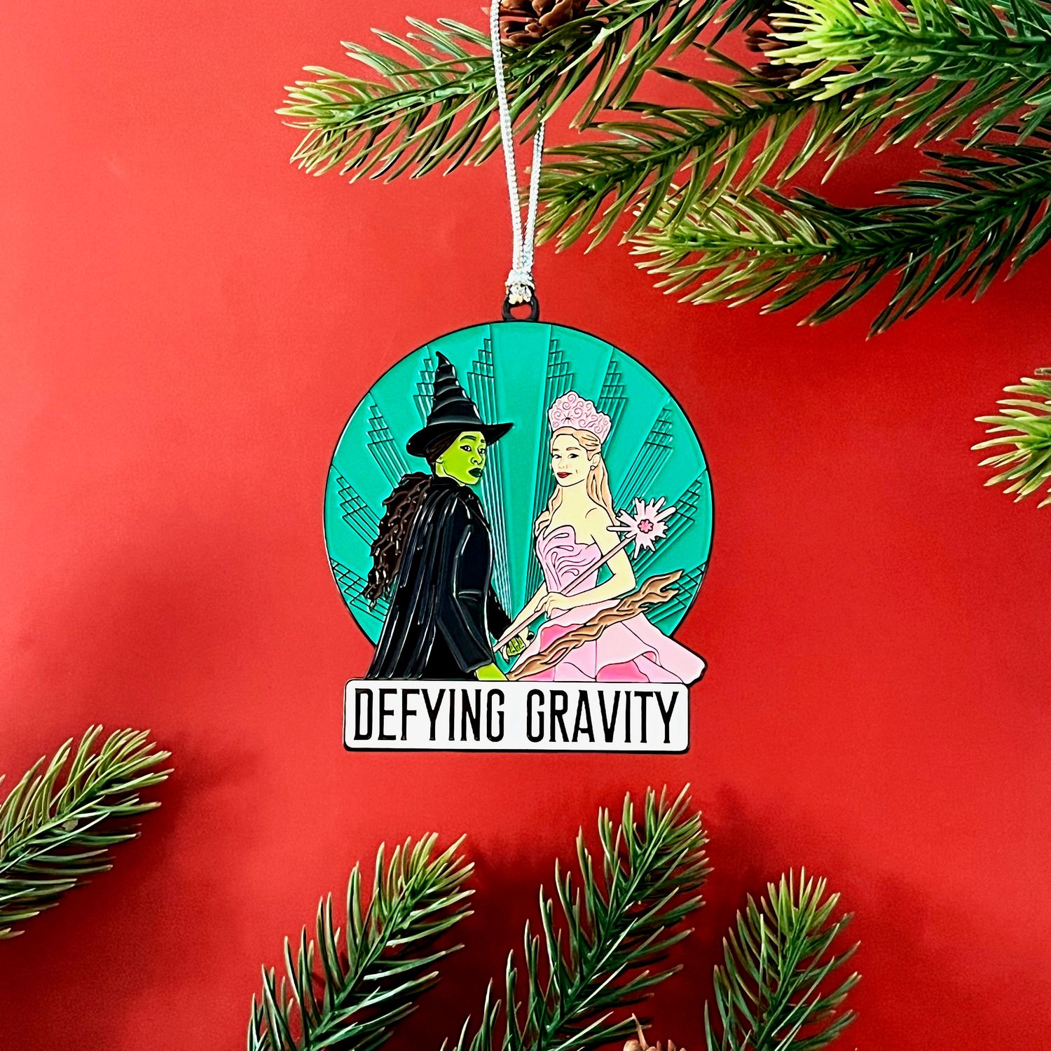 Defying Gravity Enamel Ornament