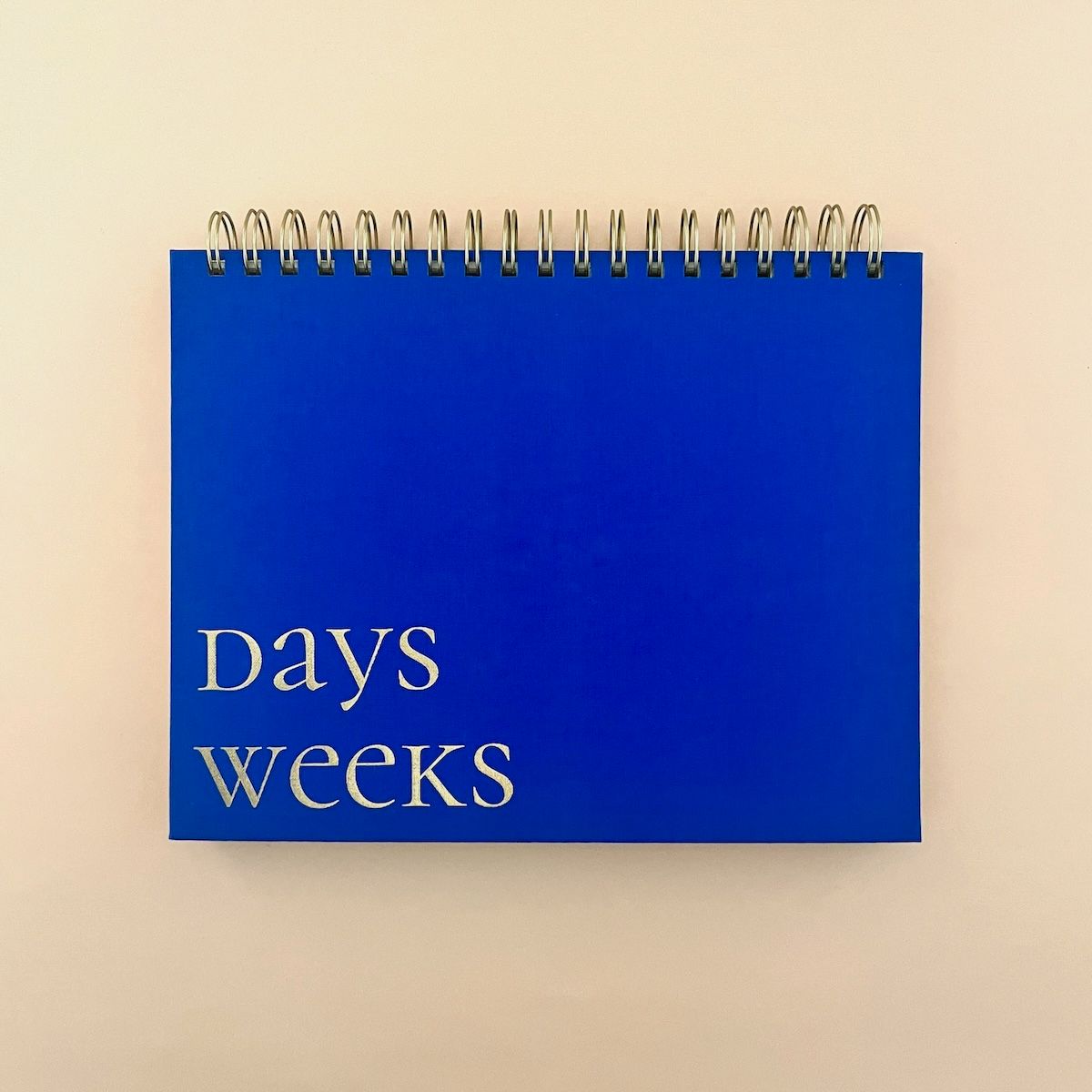 Cobalt Blue Fabric-Covered Spiral Weekly Desk Pad