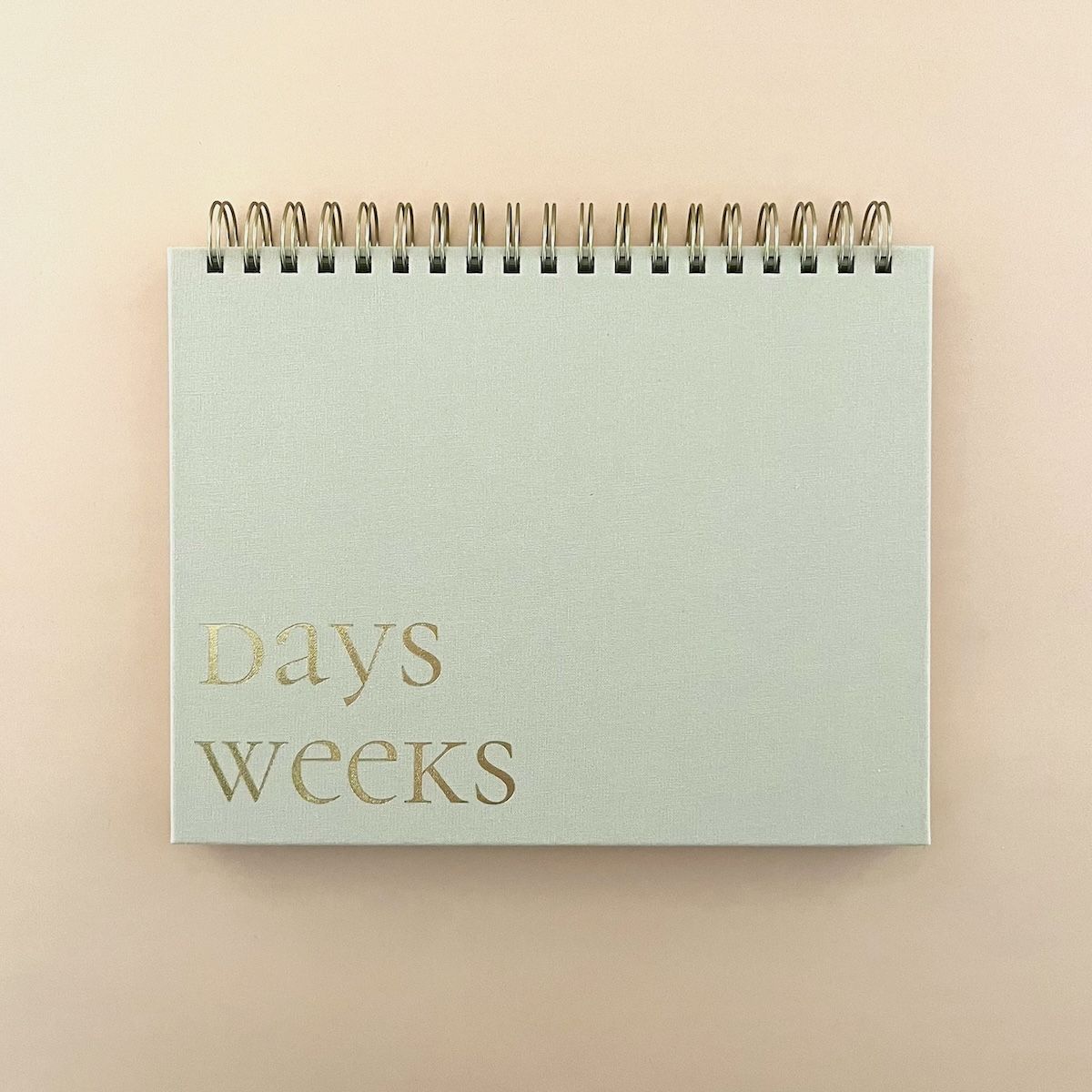 Taupe Fabric-Covered Spiral Weekly Desk Pad