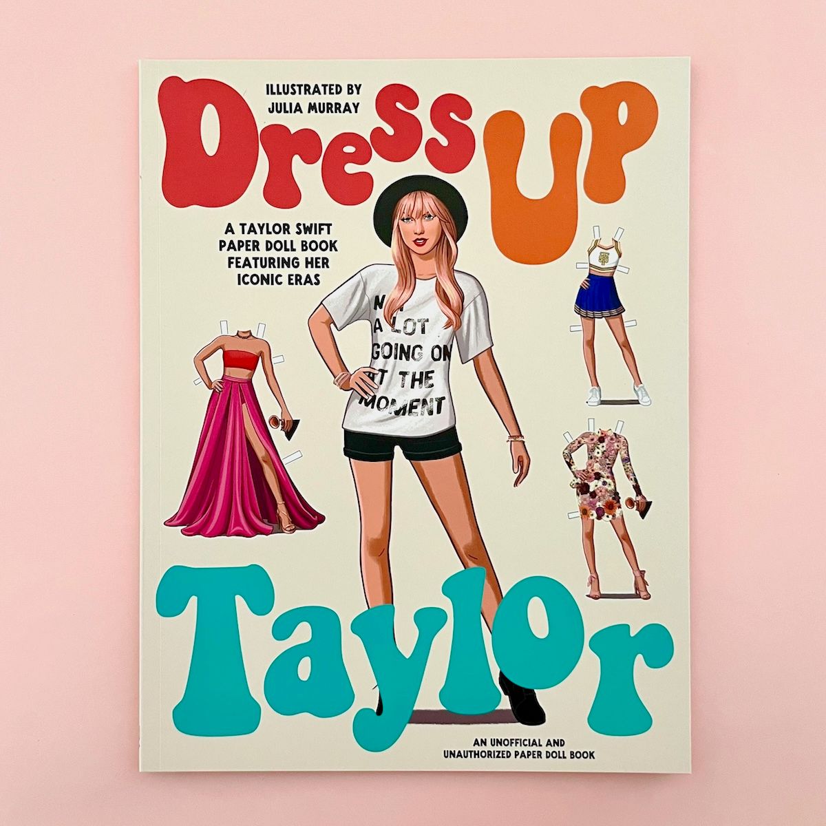 Dress Up Taylor: A Taylor Swift paper doll book featuring her iconic eras