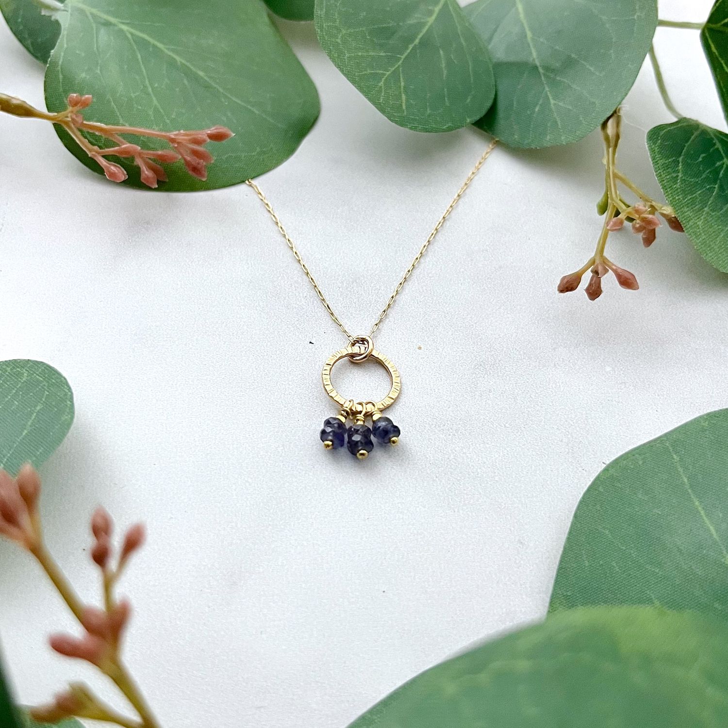 Handmade Necklace with faceted 4mm Iolite dangles  on 14k Gold filled Circle Pendant