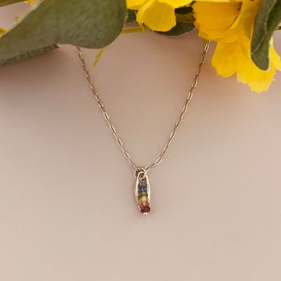 Handmade Necklace with multi-colored sapphire rainbow down, silver oval