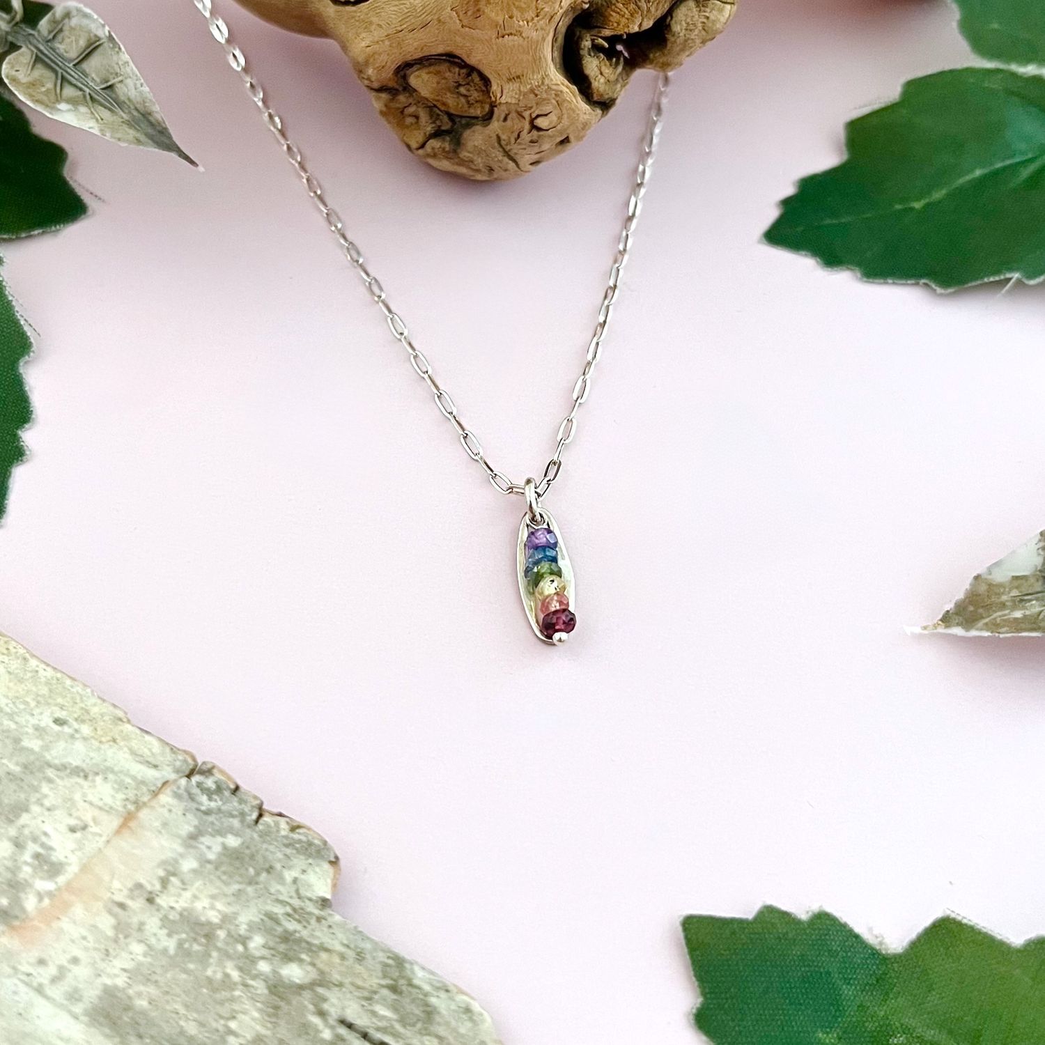 Handmade Necklace with multi-colored sapphire rainbow down, silver oval