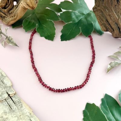 Handmade Necklace with garnet heishi knotted on hand dyed red silk, silver clasp