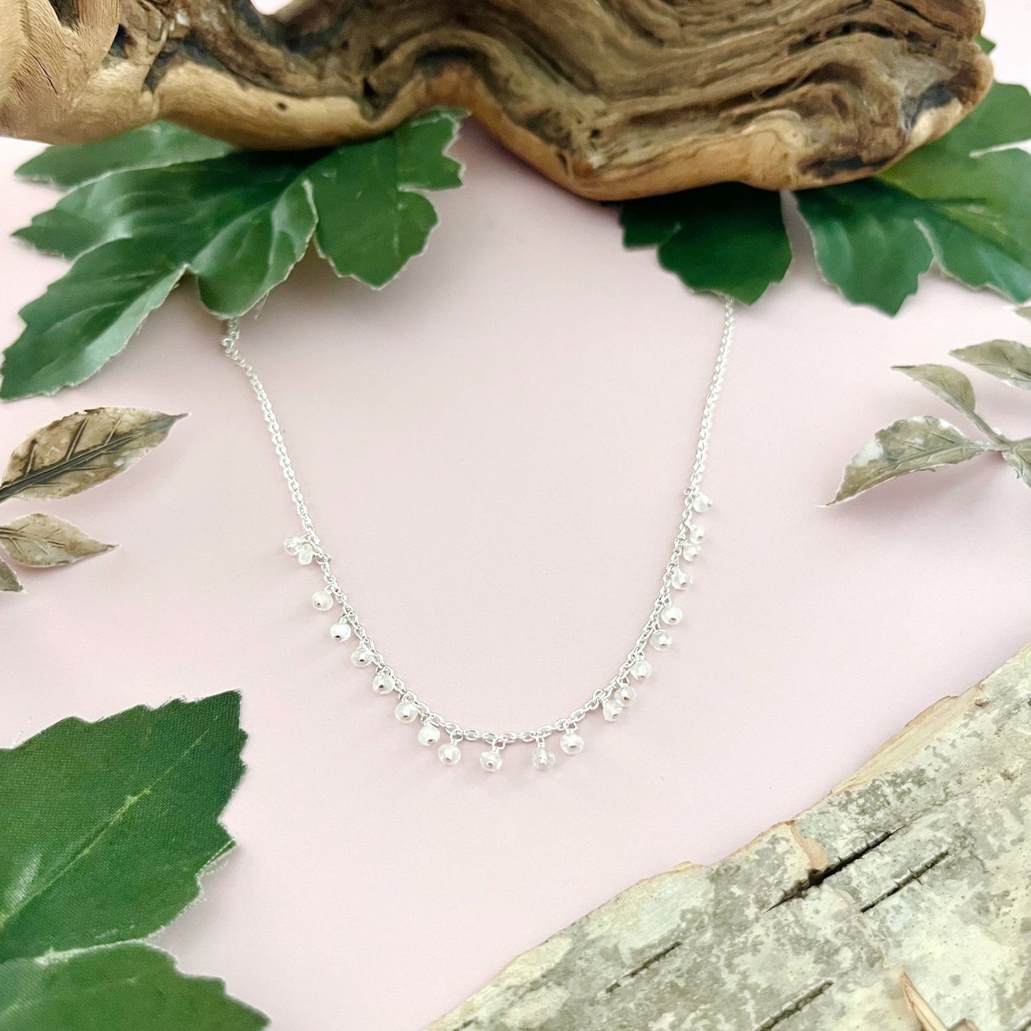 Handmade Necklace with dangle across rainbow moonstone