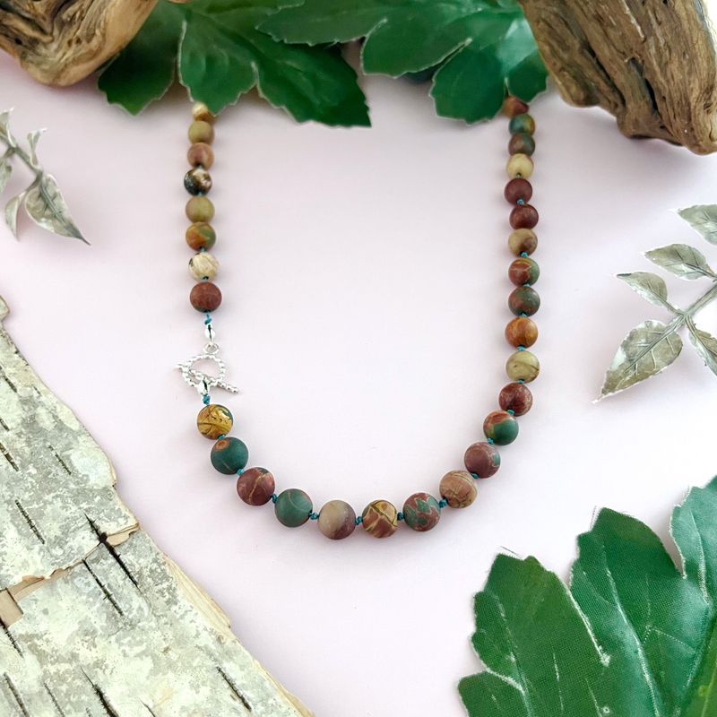 Handmade Necklace with knotted picasso japer green silk