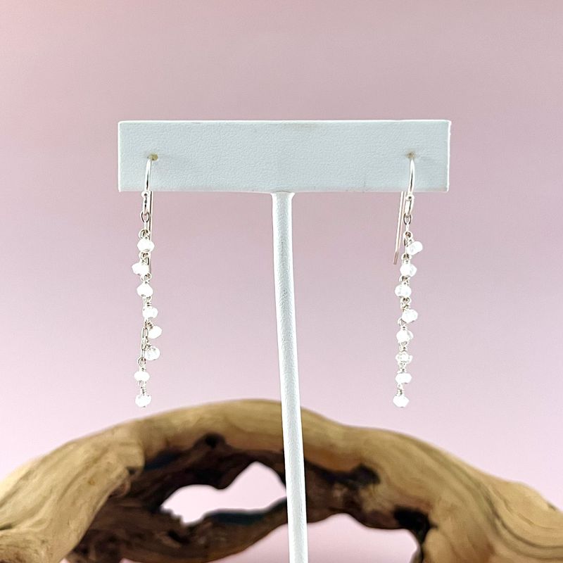 Handmade long dangling silver earrings with rainbow moonstone