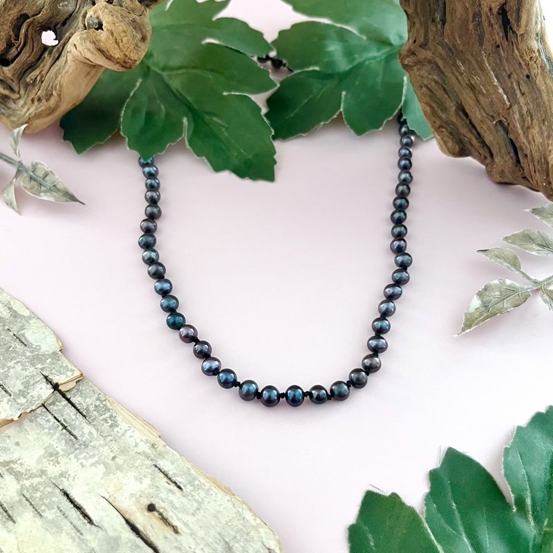 Handmade Necklace with peacock pearls knotted on black silk