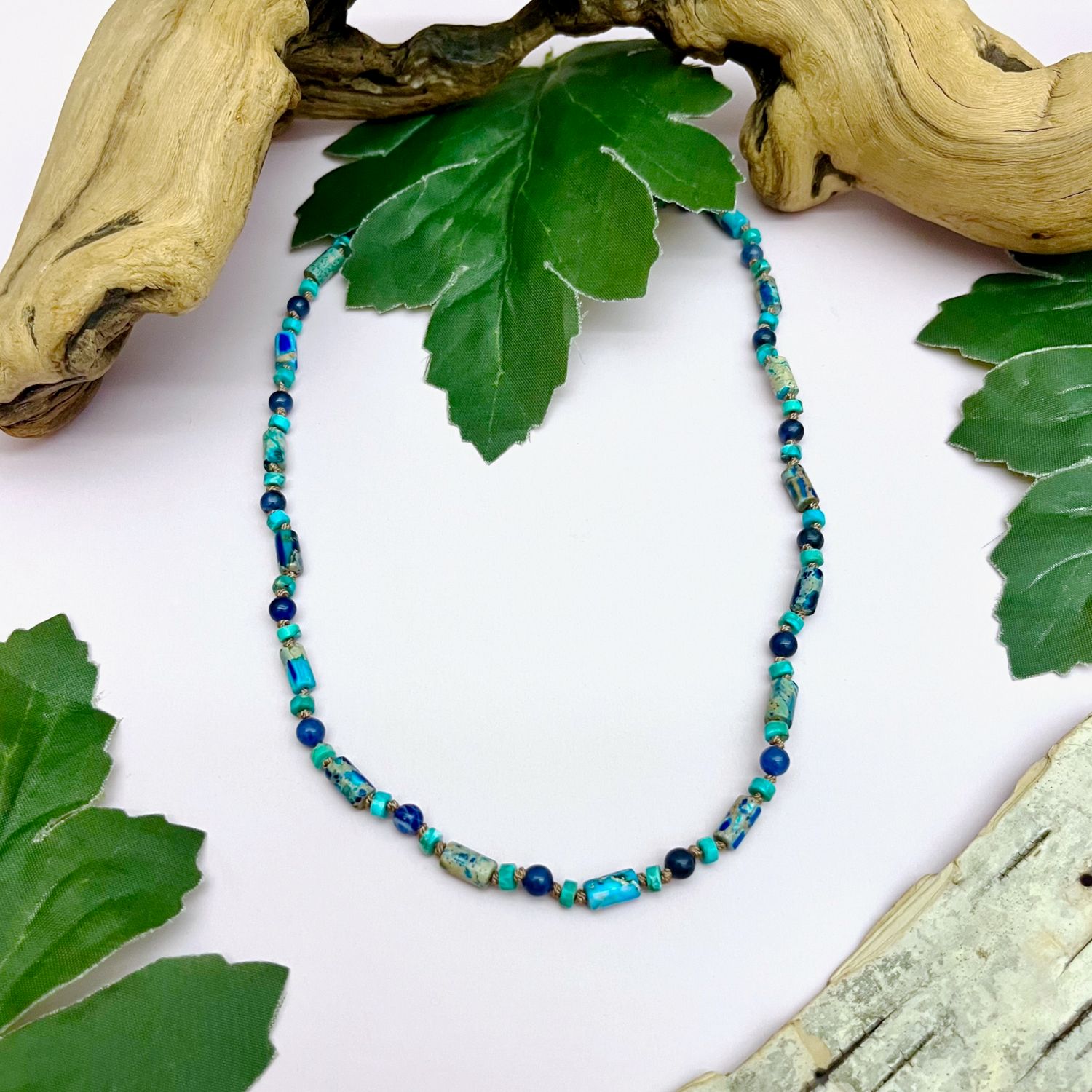 Handmade Necklace with sea sediment jasper tubes, turquoise discs, sodalite balls knotted on tan silk