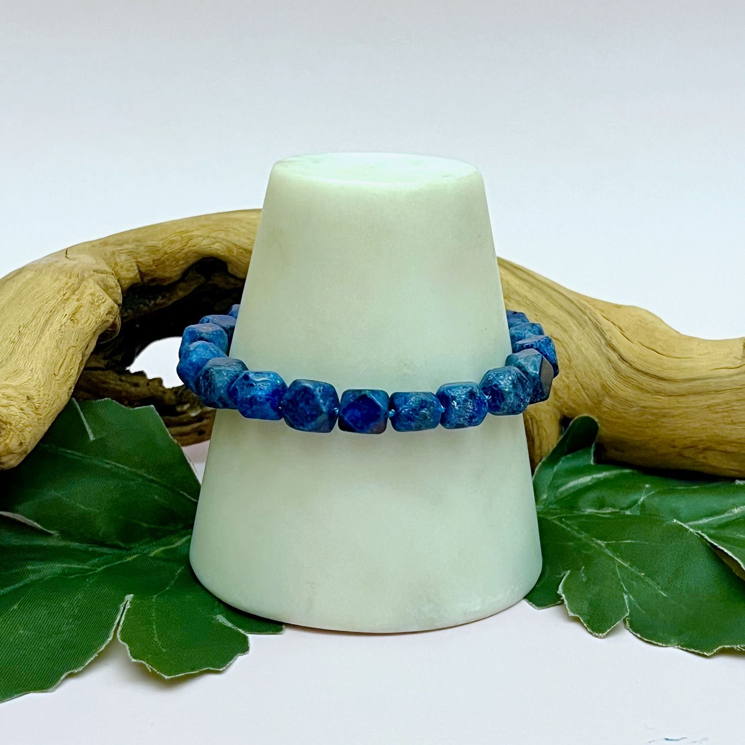 Handmade Bracelet with lapis nuggets, rainbow moonstone coin knotted on hand dyed blue silk