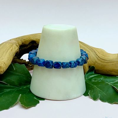 Handmade Bracelet with lapis nuggets, rainbow moonstone coin knotted on hand dyed blue silk