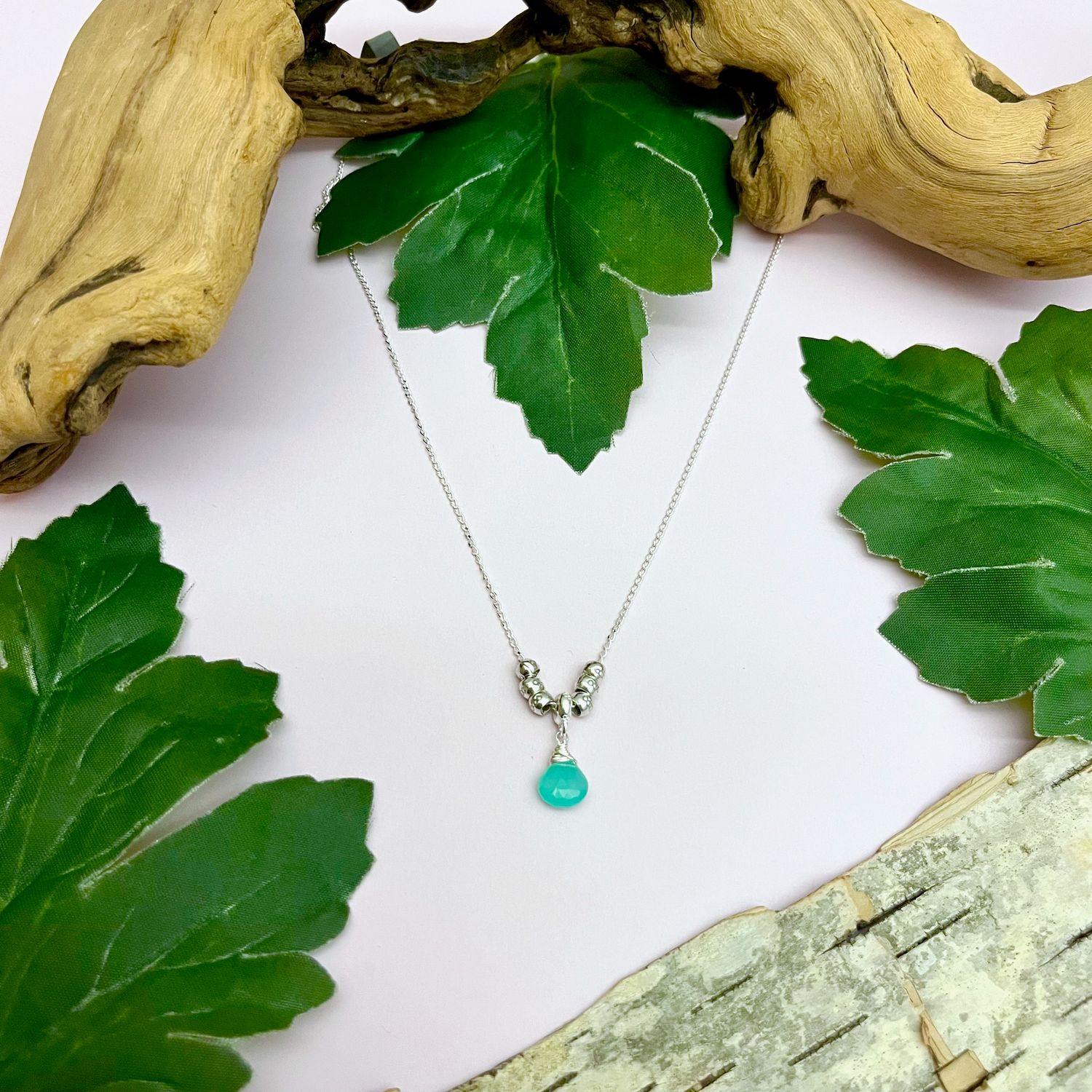 Handmade Necklace with peruvian chalcedony briolette, 6 thai flower balls, thai flower disc bail
