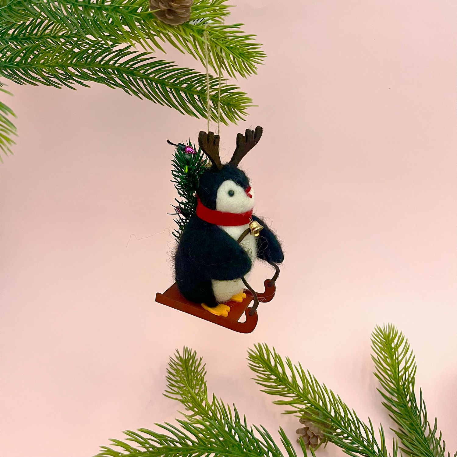 Sledding Penguin Ornament