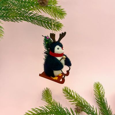 Sledding Penguin Ornament