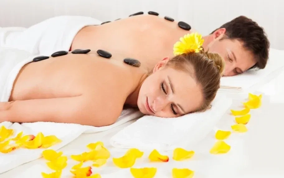 Golden Sensation - Massage aux huiles chaudes et pierres chaudes en Duo - 1h