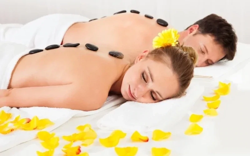 Golden Sensation - Massage aux huiles chaudes et pierres chaudes en Duo - 1h
