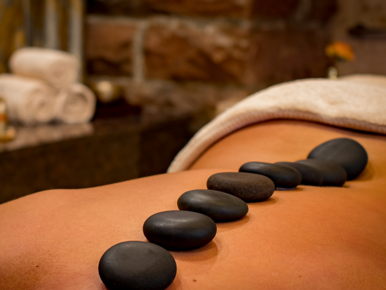Massage aux pierres chaudes - solo - 1h30