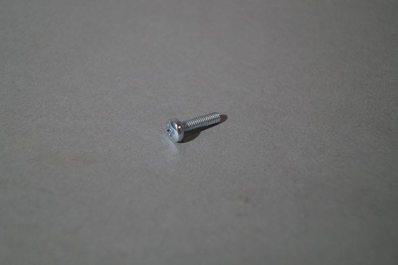 #102 Bolt, connecting Headlight Bezel to Headlight-unit