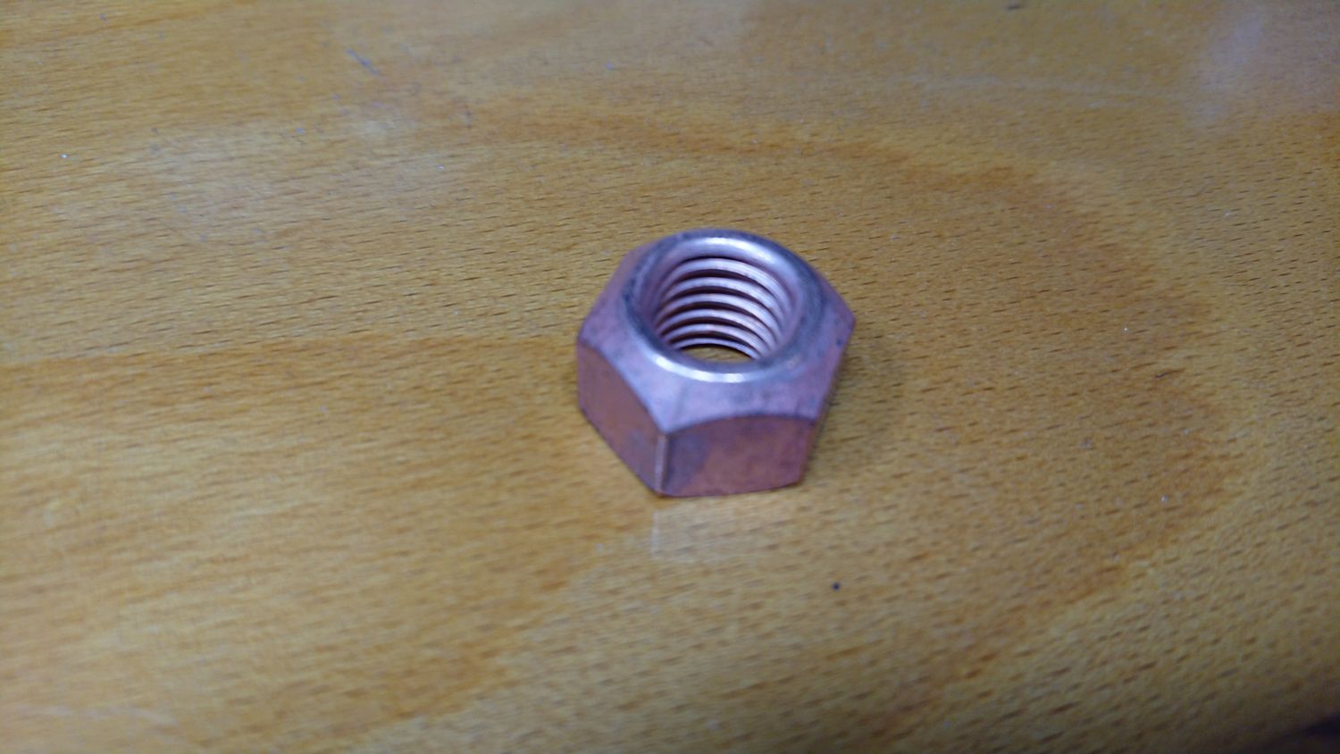 Nut for connecting downpipe to exhaust manifold