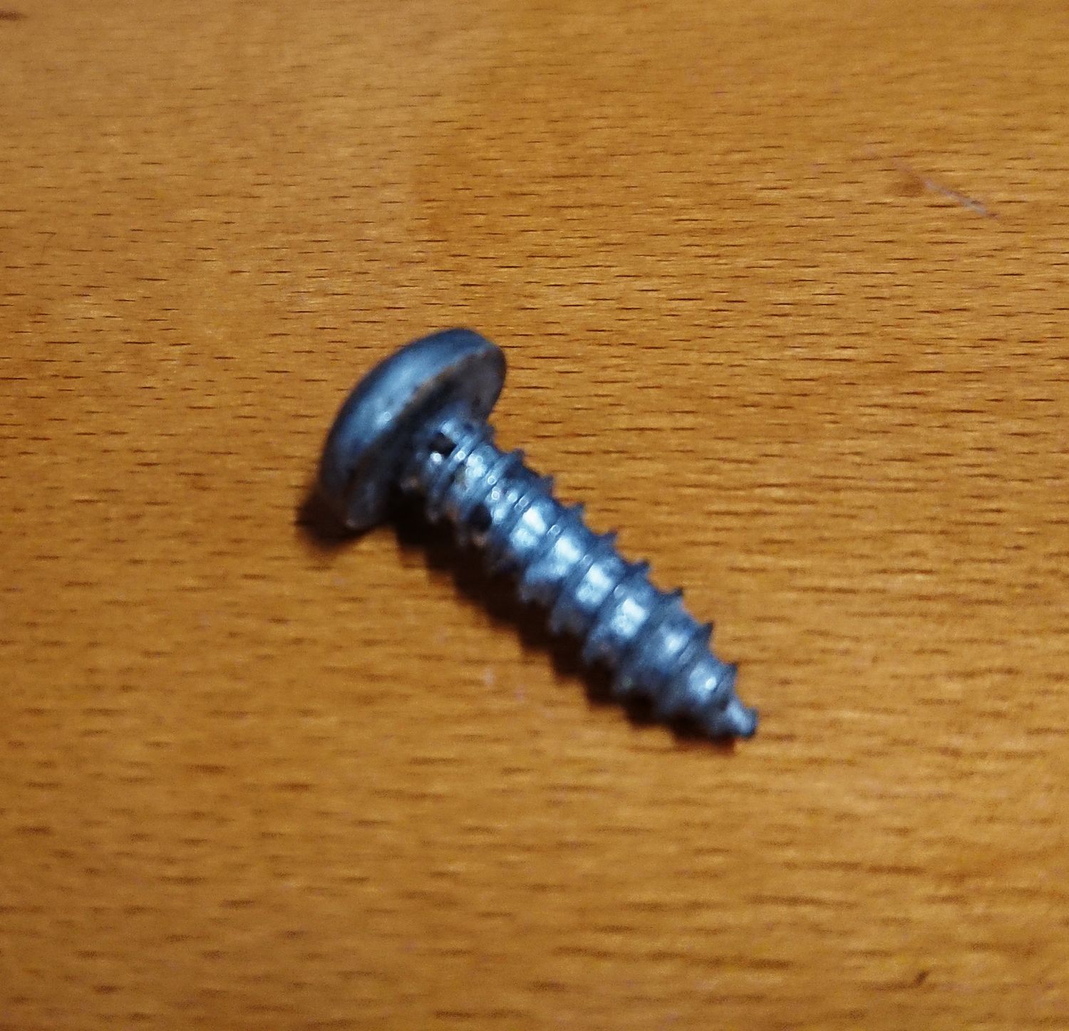 #019 Screw, Headlight to body USED