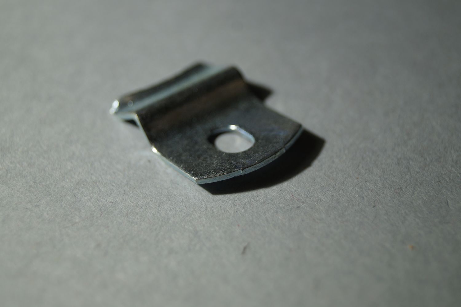 #061 Spring Bracket Type A, for holding Lens #44