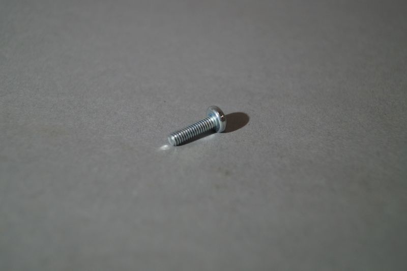 #102 Bolt for headlight Bezel USED