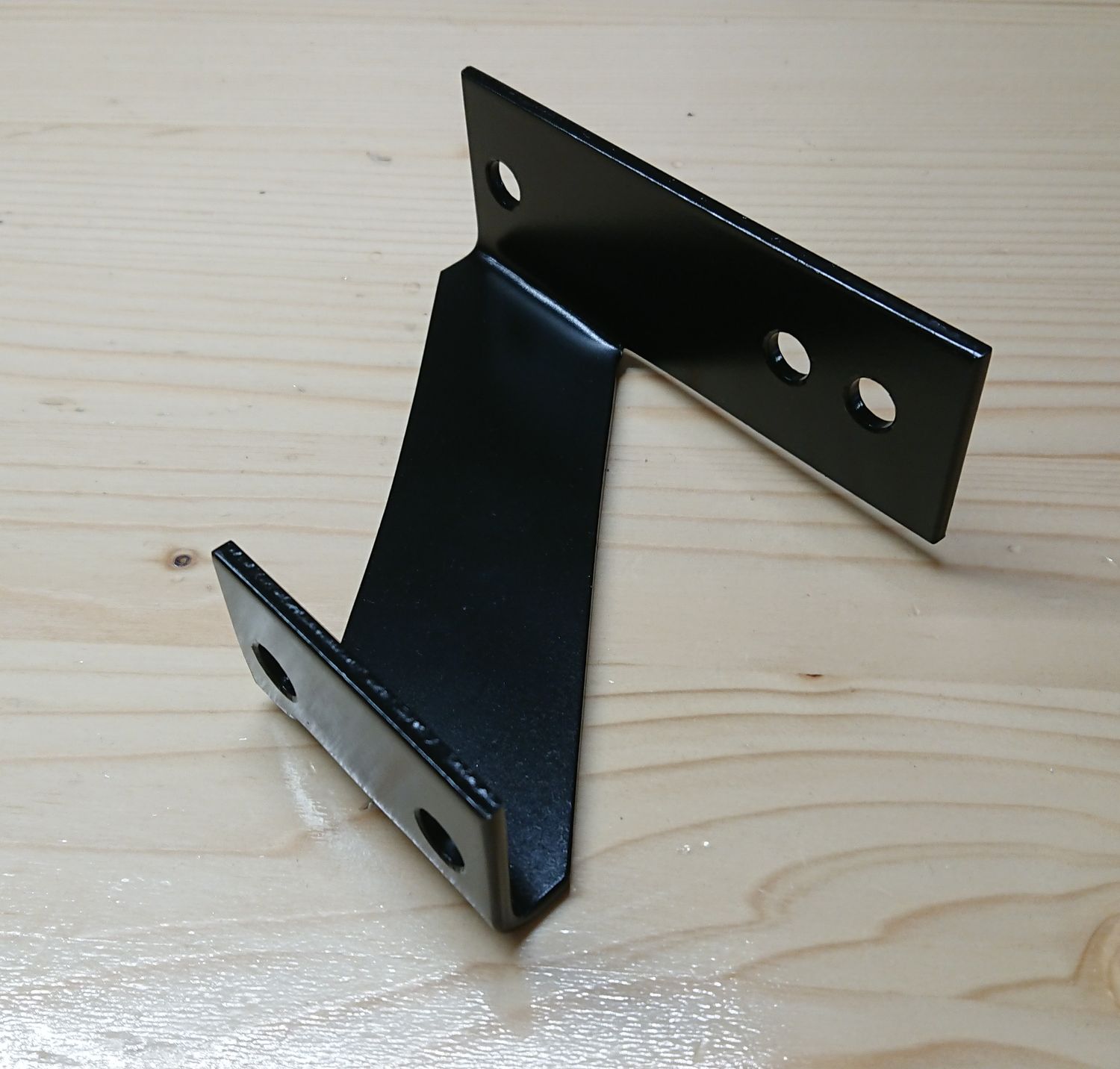 #110 Holder for exhaust muffler clamp from chassis to damping rubber. Aftermarket