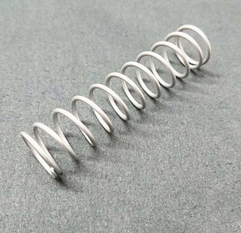#052 Spring around Metal Rod for rear Brake Drum Unit