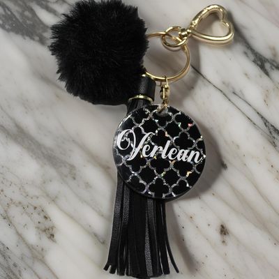 ✨ "Verlean" Black Quatrefoil Acrylic Keychain with Tassel & Pom Front