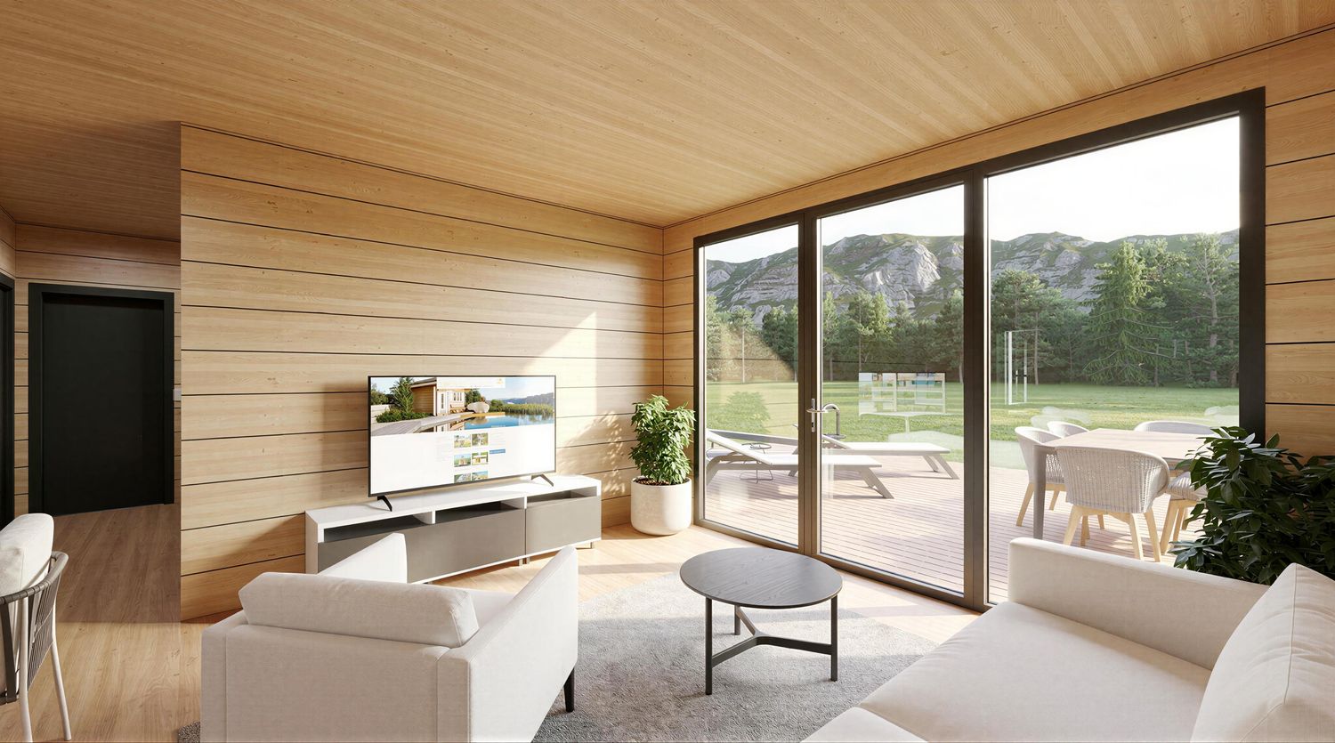 Wohnzimmer im Tinyhaus Model M – heller Wohnbereich mit großen Fenstern und viel Tageslicht