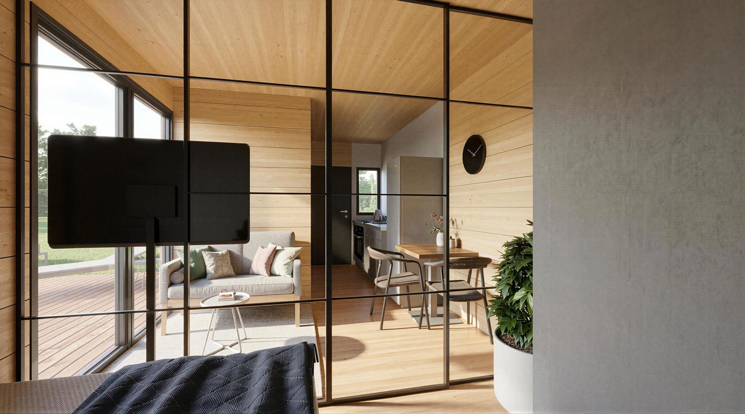 Küche im Tinyhaus Model S – kompaktes Minihaus aus Holz mit moderner Küchenlösung im Loftstil