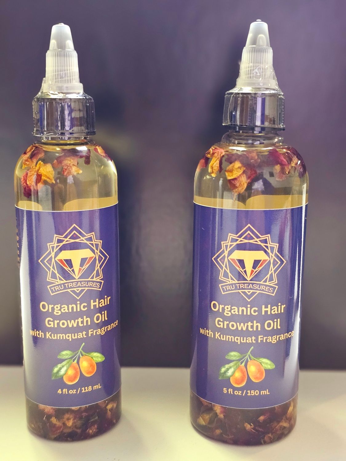 The Organic Hair Growth Oil from Tru-Treasures is crafted with the finest natural ingredients to promote healthy hair growth and deep hydration.