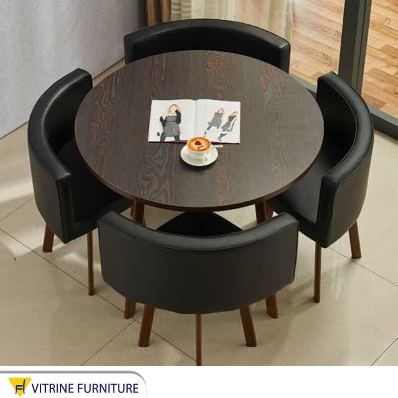 Round dining table with 4 chairs with a triangular base