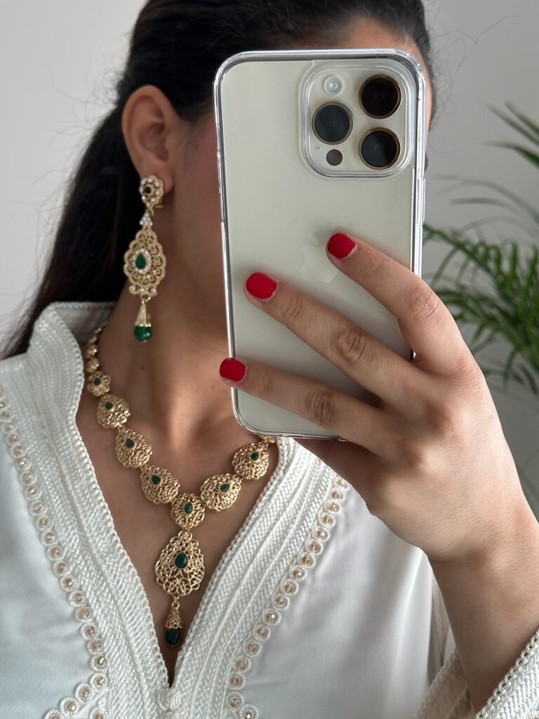 Traditional ear rings in Gold with green stones