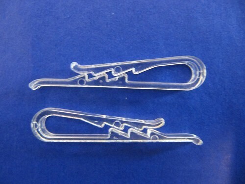 03 - Clips in plastica trasparente per camicie