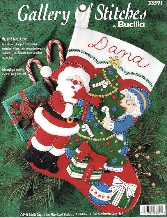 Mr. and Mrs. Claus   Decorating Tree