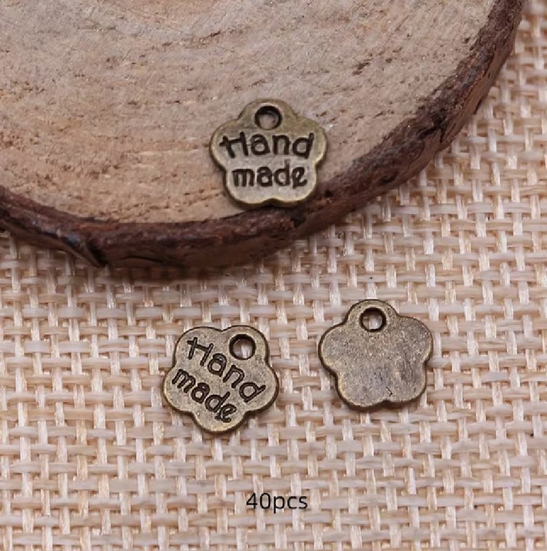 50pcs Antique Brass Color 'Handmade' Small Flower-Shaped Charm
