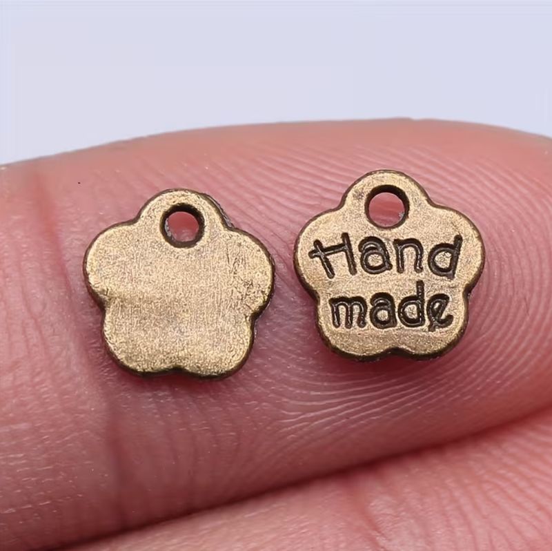 50pcs Antique Brass Color 'Handmade' Small Flower-Shaped Charm