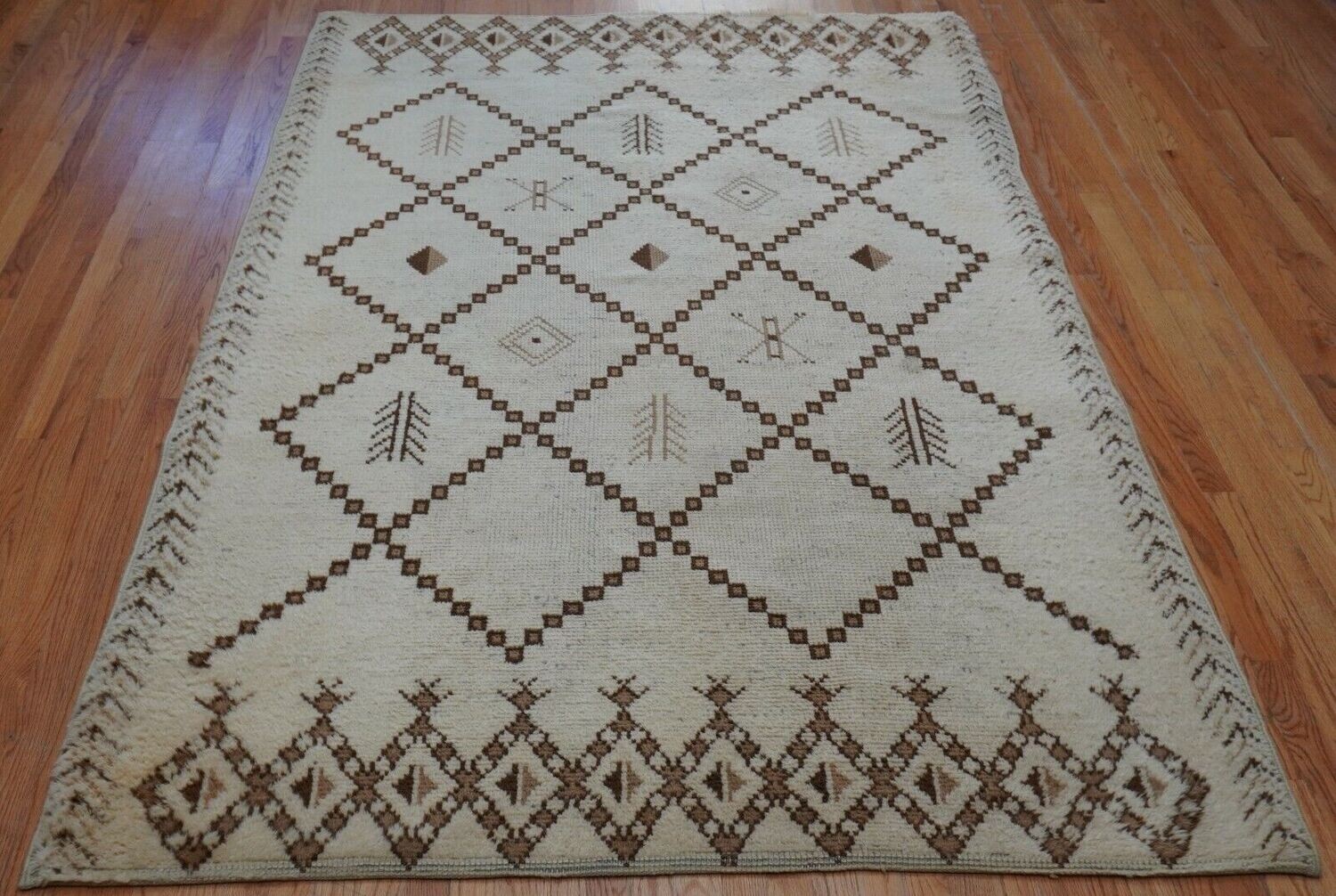 5'5" x 8' Antique Moroccan Hand Knotted Natural Ivory Wool Rug