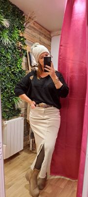 La jupe longue fendue en jean