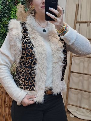 Le gilet sans manches fourrure