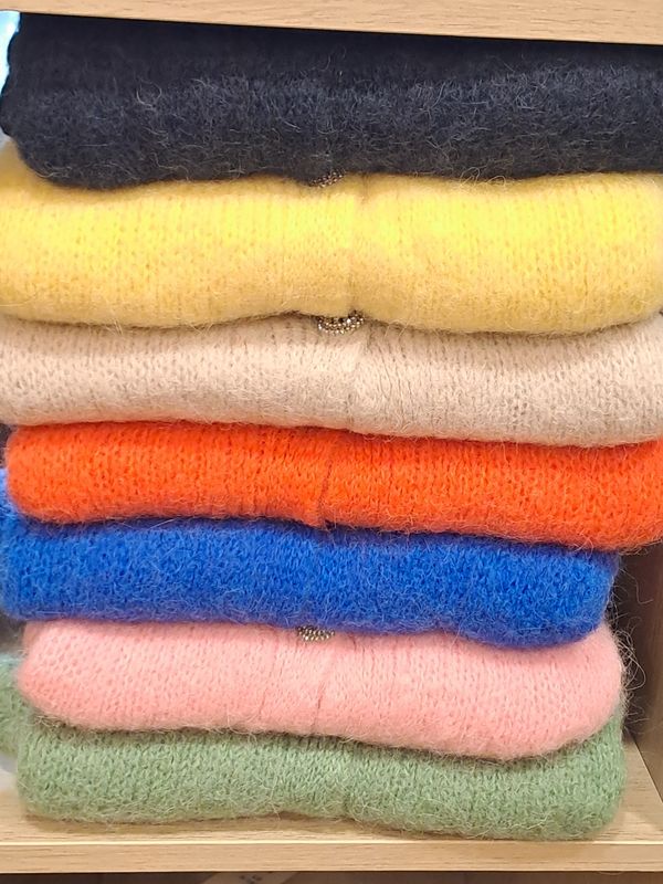 Le pull sans manches oversize