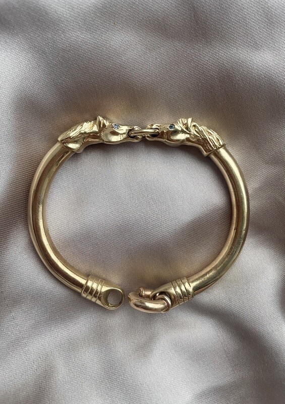 Double horse&#39;s head bangle - gold