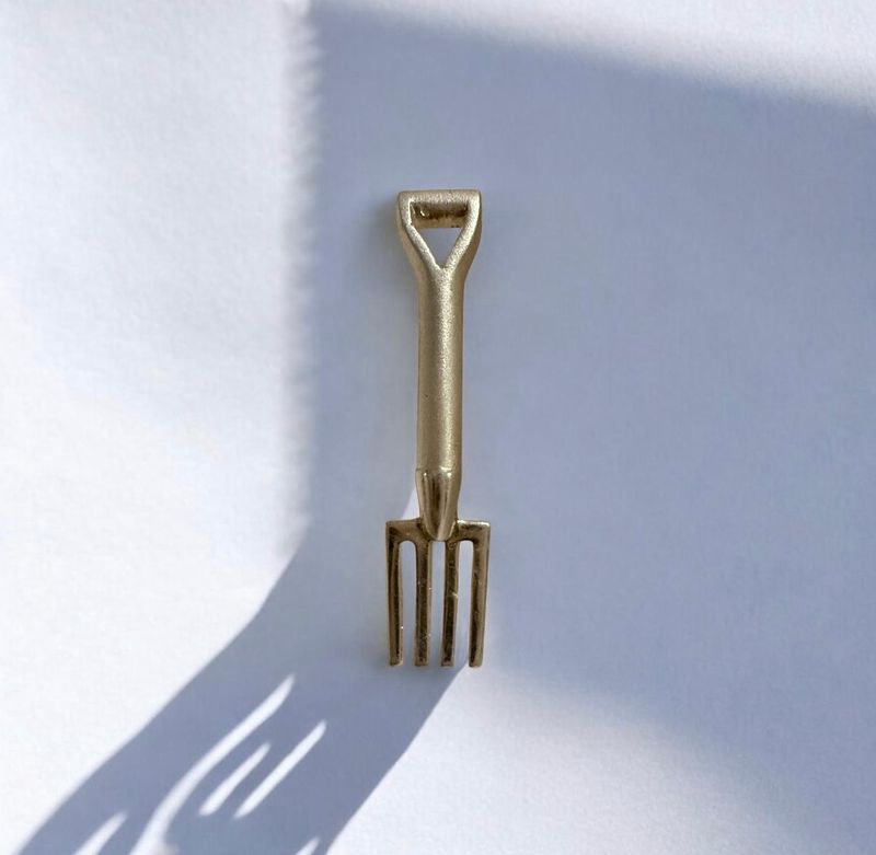 Garden fork brooch - gold
