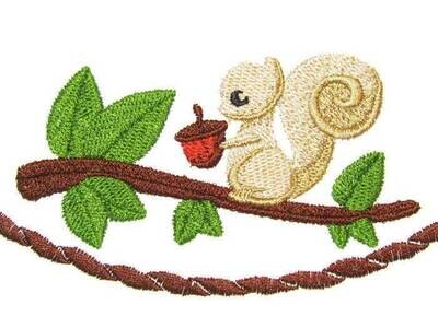 Squirrel and his Nut embroidered quilt label to customize with your personal message