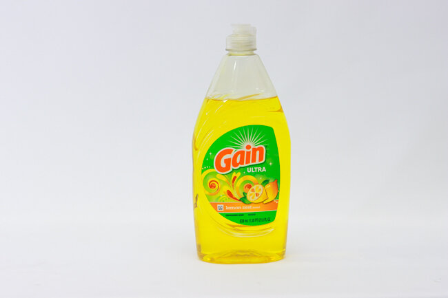 GAIN ULTRA  ANTIB. LEMON ZEST DISHWASHING LIQUID 21.6OZ..